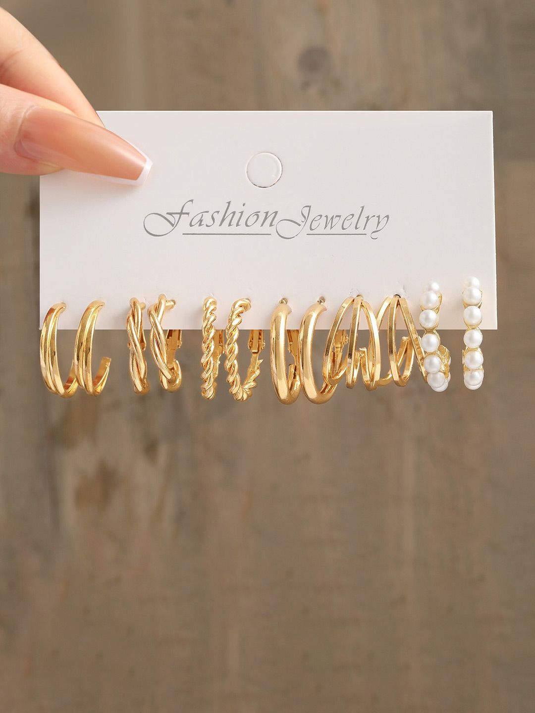 ee6425c7-73ee-41c7-bc5d-fdd7e3ae13d81703997294854ShiningDivaFashionGold-TonedHoopEarrings5.jpg